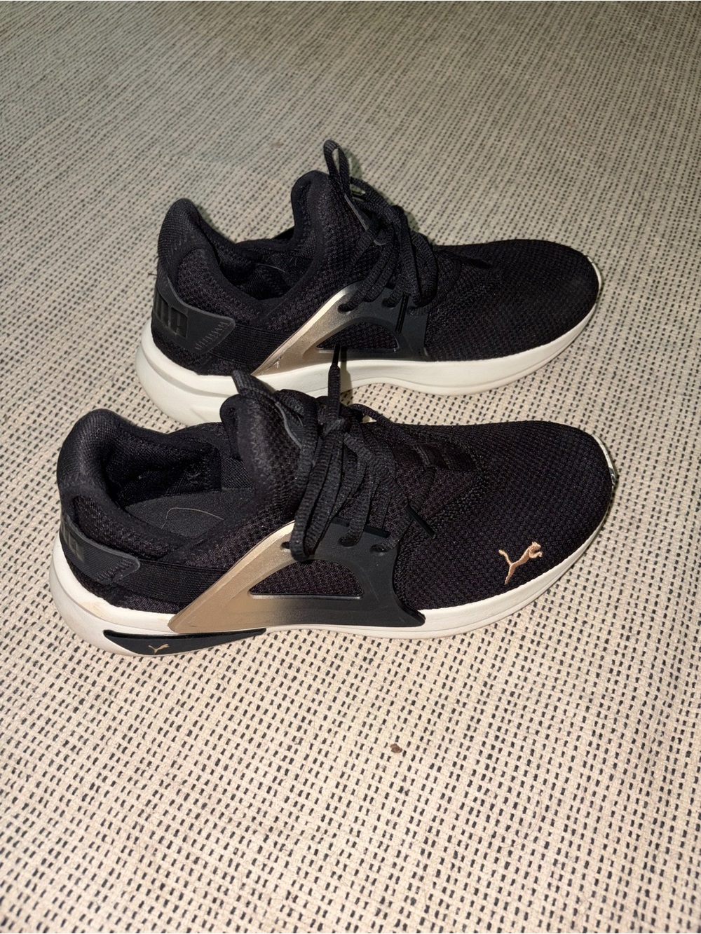 Puma Black Sneakers with Gold Accent